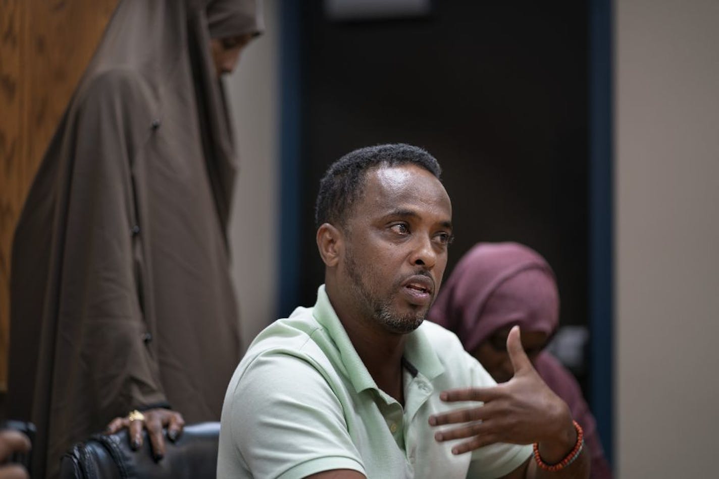 Mohamed Khayre spoke about his child during a meeting where parents at one of Minnesota's oldest charter schools is calling for big changes to improve the quality of education their kids are receiving at Cedar Riverside Community School Tuesday July,16 2019 in Minneapolis, MN.