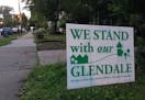 Signs have sprouted around the Prospect Park neighborhood in support of saving the Glendale row houses from being razed.