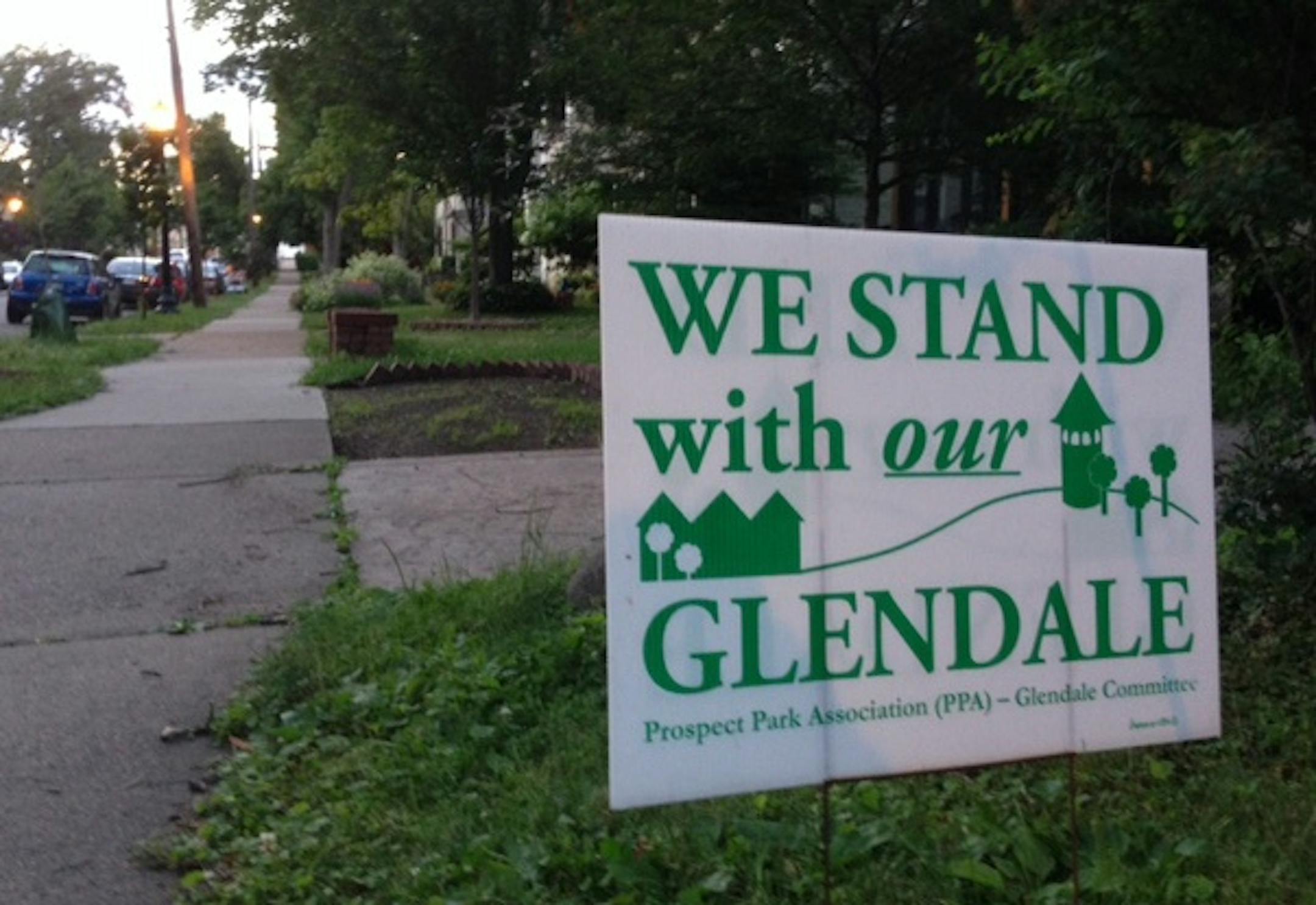 Signs have sprouted around the Prospect Park neighborhood in support of saving the Glendale row houses from being razed.