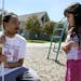 He&#x2019;s just a big kid: Jordan Richardson talks to Earle Brown Elementary pre-Kindergarten student Bella Valencia on the playground. To Bella and 