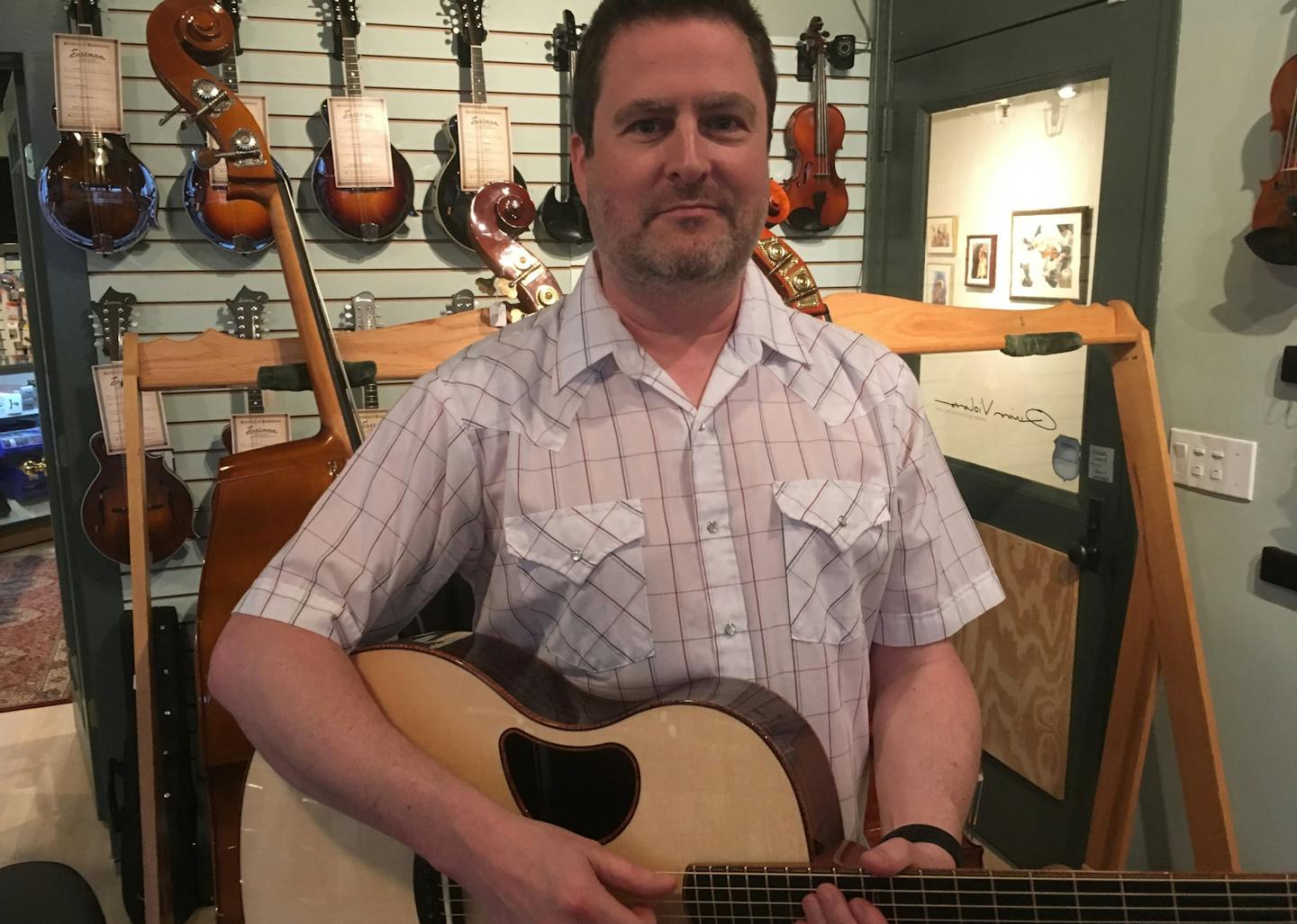 Chris Quinn of Quinn Violins is strumming into the next act of his 30-year entrepreneurial adventure. Photo:Neal.St.Anthony@startribune.com