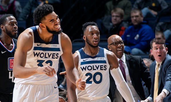 Wolves center Karl Anthony-Towns (left, with Wolves guard Josh Okogie) reacted after a shot in the third quarter against the Clippers at Target Center