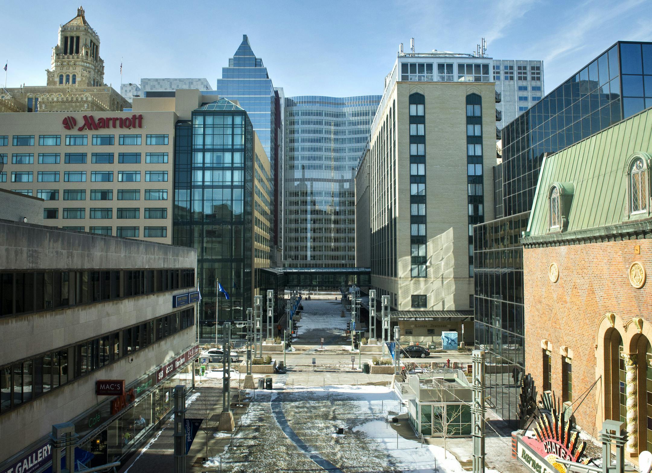 This view sweeps across Peace Plaza past the Marriott and Kahler hotels to the main Mayo Clinic complex in the background. For more than a century, Rochester has been shaped and defined by the clinic. Now legislators are being asked to approve half a billion dollars toward its downtown makeover.