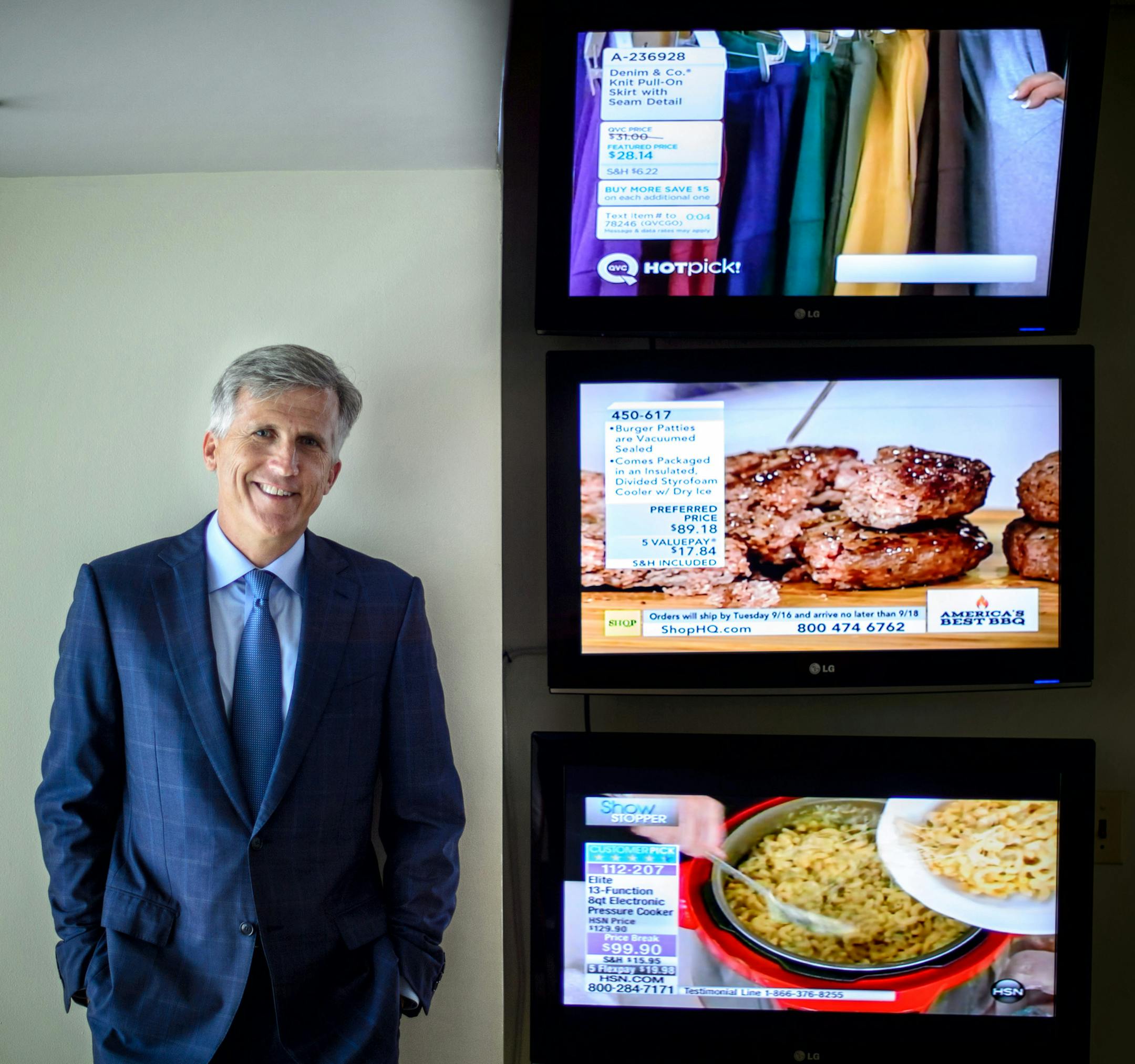 New ValuVision CEO Mark Bozek in his Eden Prairie headquarters. Bozek keeps an eye on his own company's feed in the center and competitors QVC on top and HSN, bottom. ] Eden Prairie , MN -- , Tuesday, September 9, 2014. GLEN STUBBE * gstubbe@startribune.com