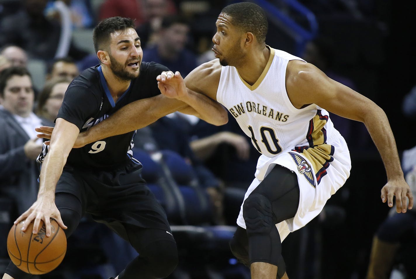 Minnesota Timberwolves guard Ricky Rubio (9) drives against New Orleans Pelicans guard Eric Gordon during the second half of an NBA basketball game Tuesday, Jan. 19, 2016, in New Orleans. The Pelicans won 114-99.(AP Photo/Jonathan Bachman)