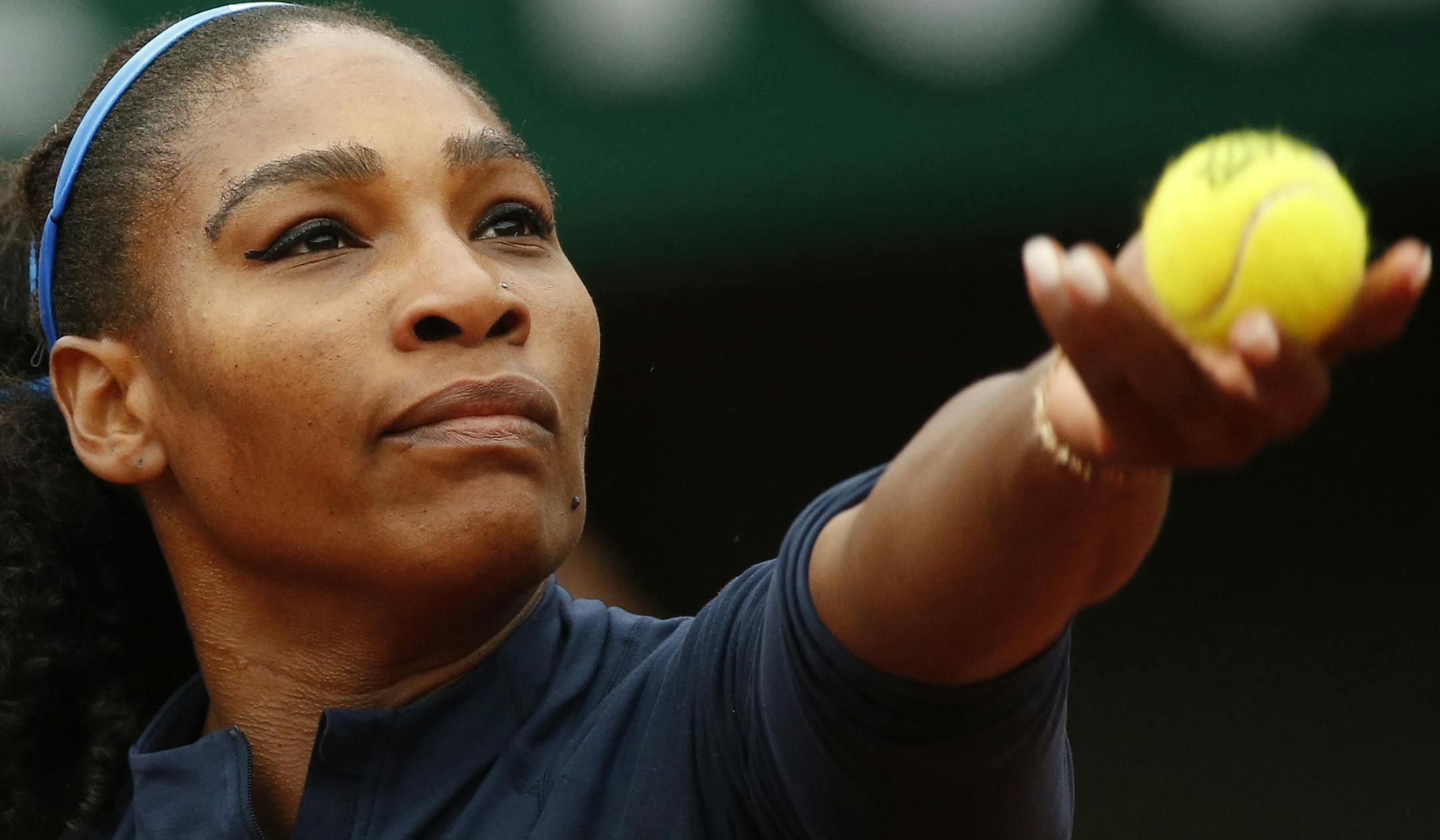 FILE - In this June 3, 2016 file photo, Serena Williams of the U.S. serves the ball in the semifinal match of the French Open tennis tournament against Netherlands' Kiki Bertens at the Roland Garros stadium in Paris, France. (AP Photo/Alastair Grant, File)