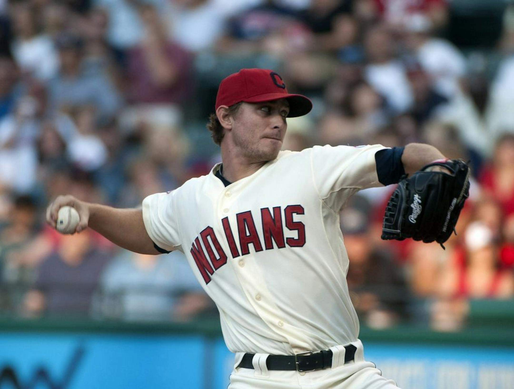 Cleveland Indians pitcher Josh Tomlin delivers to Minnesota Twins batter Denard Span during the first inning a baseball game, Saturday, Aug. 13, 2011, in Cleveland.