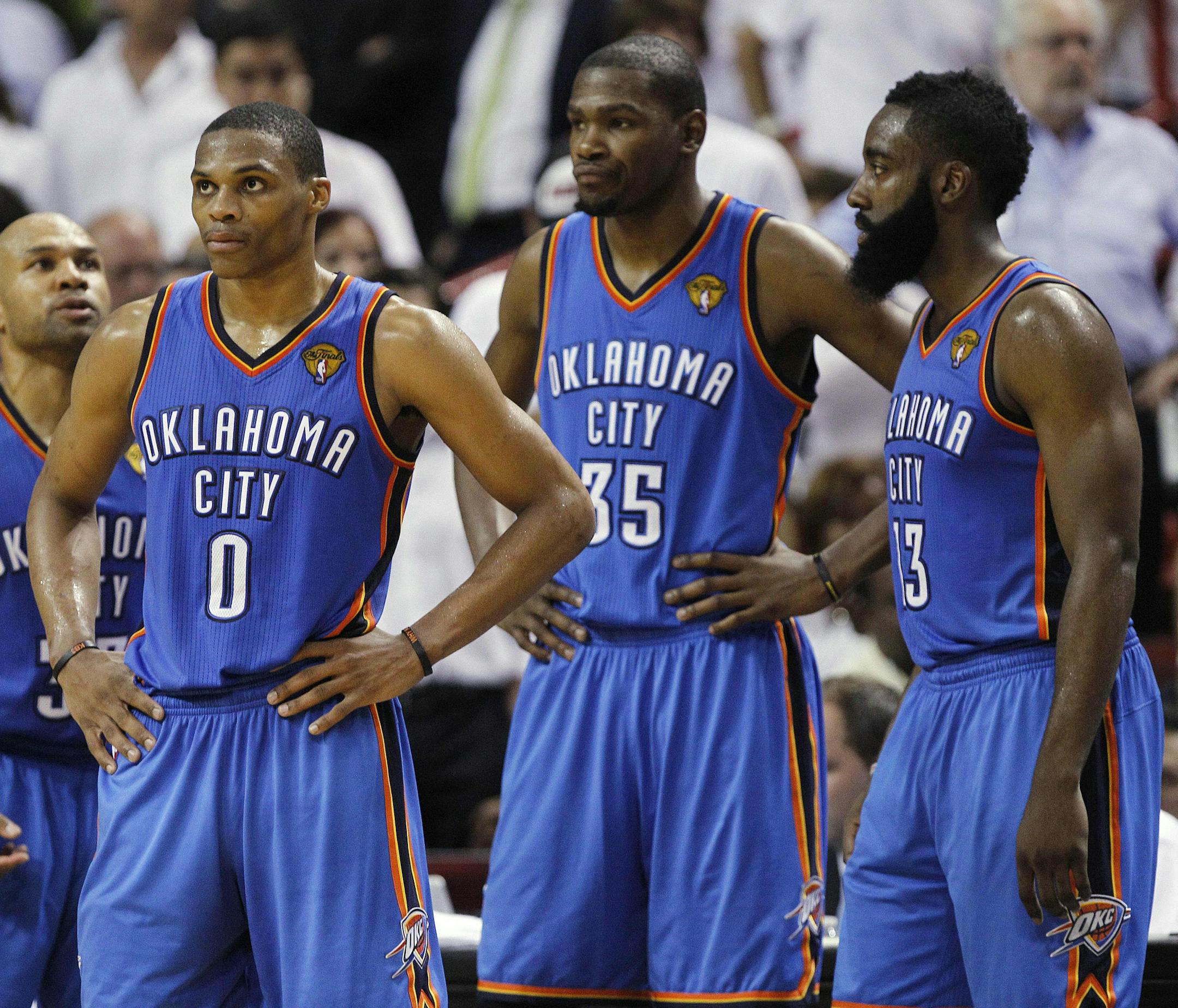 Oklahoma City Thunder players, Derek Fisher, Russell Westbrook, Kevin Durant, James Harden, from left, react at a break against the Miami Heat during the second half at Game 4 of the NBA finals basketball series, Tuesday, June 19, 2012, in Miami. The Heat won 104-98. (AP Photo/Lynne Sladky)