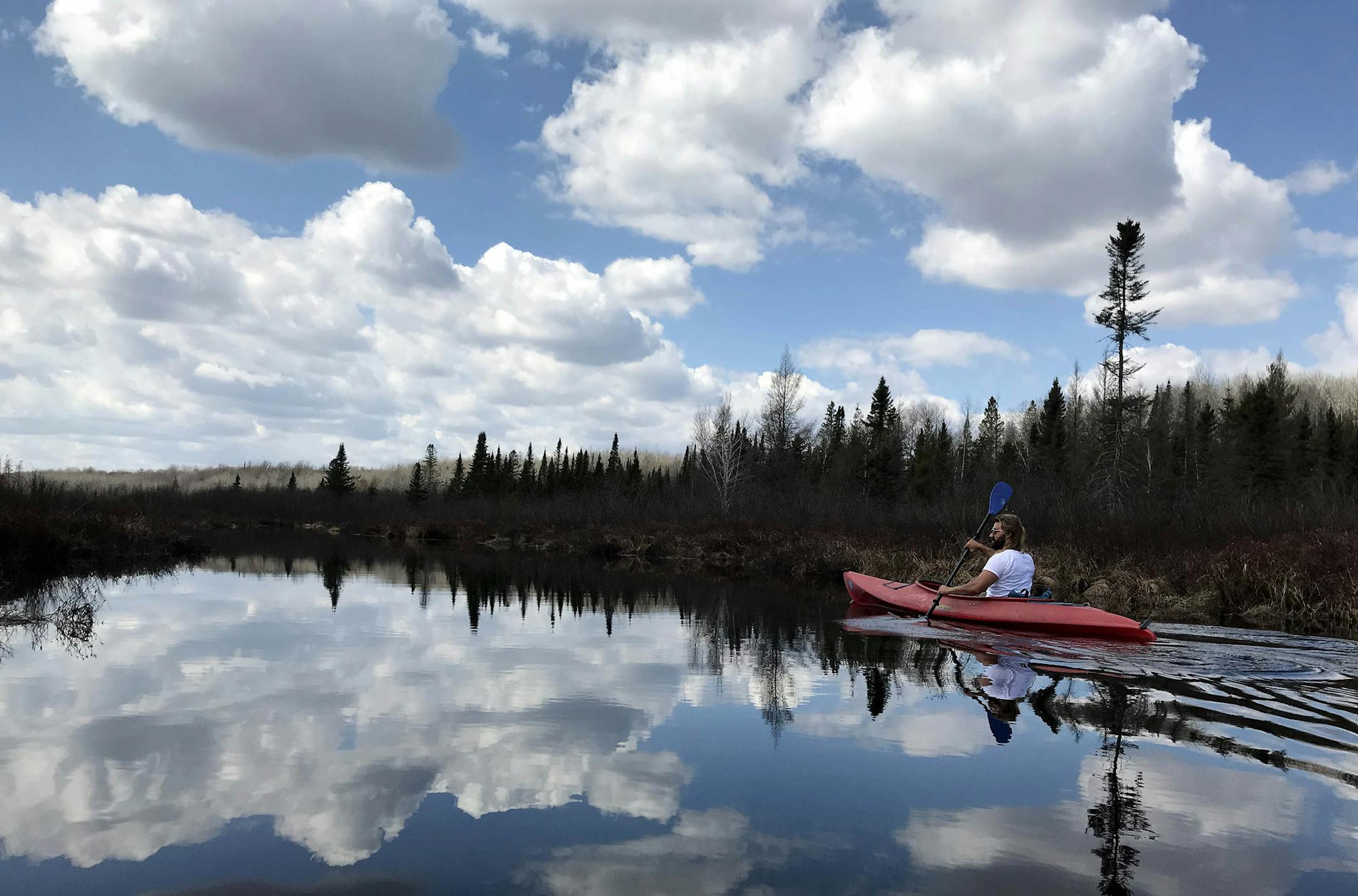 Great to hear from you. I enjoyed our conversation a few years ago when I was MOA's tourism director. I believe we were at the EMT conference during which you were part of a panel discussion. You can list me as Doug Killian from Lake Elmo. The photo is of my son Keith Killian when we were kayaking on Whisky Creek which connects Tea Lake and Coffee Lake in the WI Chequamegon-Nicolet National Forest. Our family has a rustic cabin on Tea Lake which is three miles from the closest electrical line. M