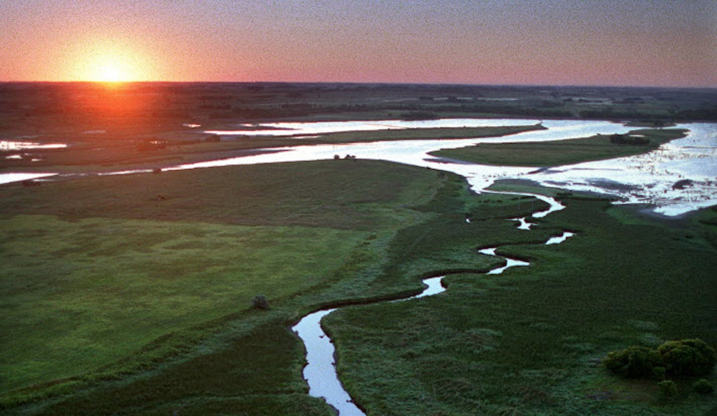 Near its beginning the Minnesota River is a beautiful place. Here, as it winds through Big Stone National Wildlife Refuge south east of Ortonville, the refuge serves as a major water fowl production and migration area and also contains more than 6,000 acres of grassland, including large tracts of native prairie. ORG XMIT: MIN2014091915422655 ORG XMIT: MIN1409191917113756 ORG XMIT: MIN1703141740525579