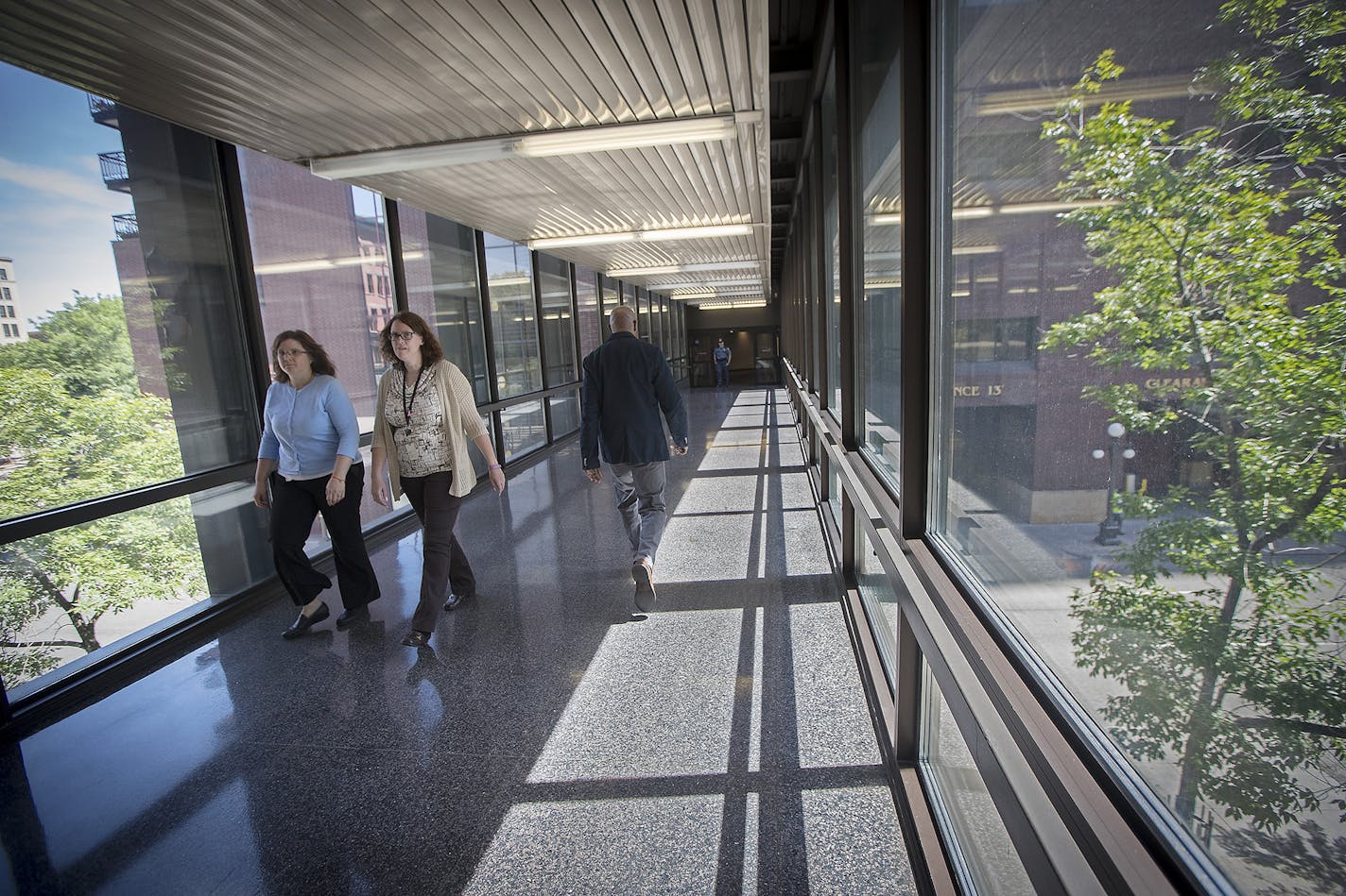 Pedestrians made their way through a skyway in the Mears Park area, Wednesday, June 7, 2017 in St. Paul, MN. The city will consider Brooks' request to close her skyway earlier at Wednesday's council meeting. ] ELIZABETH FLORES &#xef; liz.flores@startribune.com ORG XMIT: MIN1706071533562640