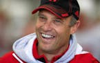FILE - In this April 8, 2015, file photo, Nebraska head coach Mike Riley smiles during an NCAA college football spring practice in Lincoln, Neb. Riley