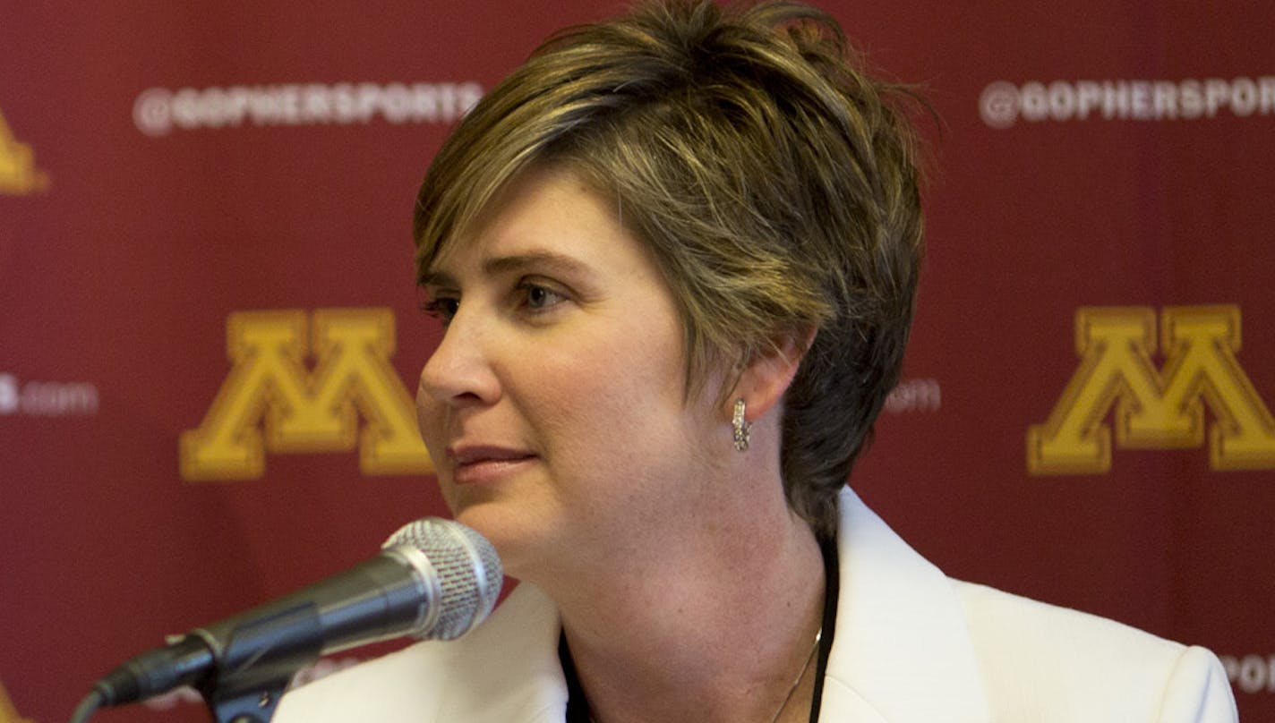 Athletic Director Norwood Teague introduced Marlene Stollings as the new women's basketball coach Tuesday afternoon. ] JEFF WHEELER &#xef; jeff.wheeler@startribune.com The Gophers introduced their new women's basketball coach, Marlene Stollings, at a news conference at Williams Arena Tuesday afternoon, April 8, 2014. ORG XMIT: MIN1404081926031834