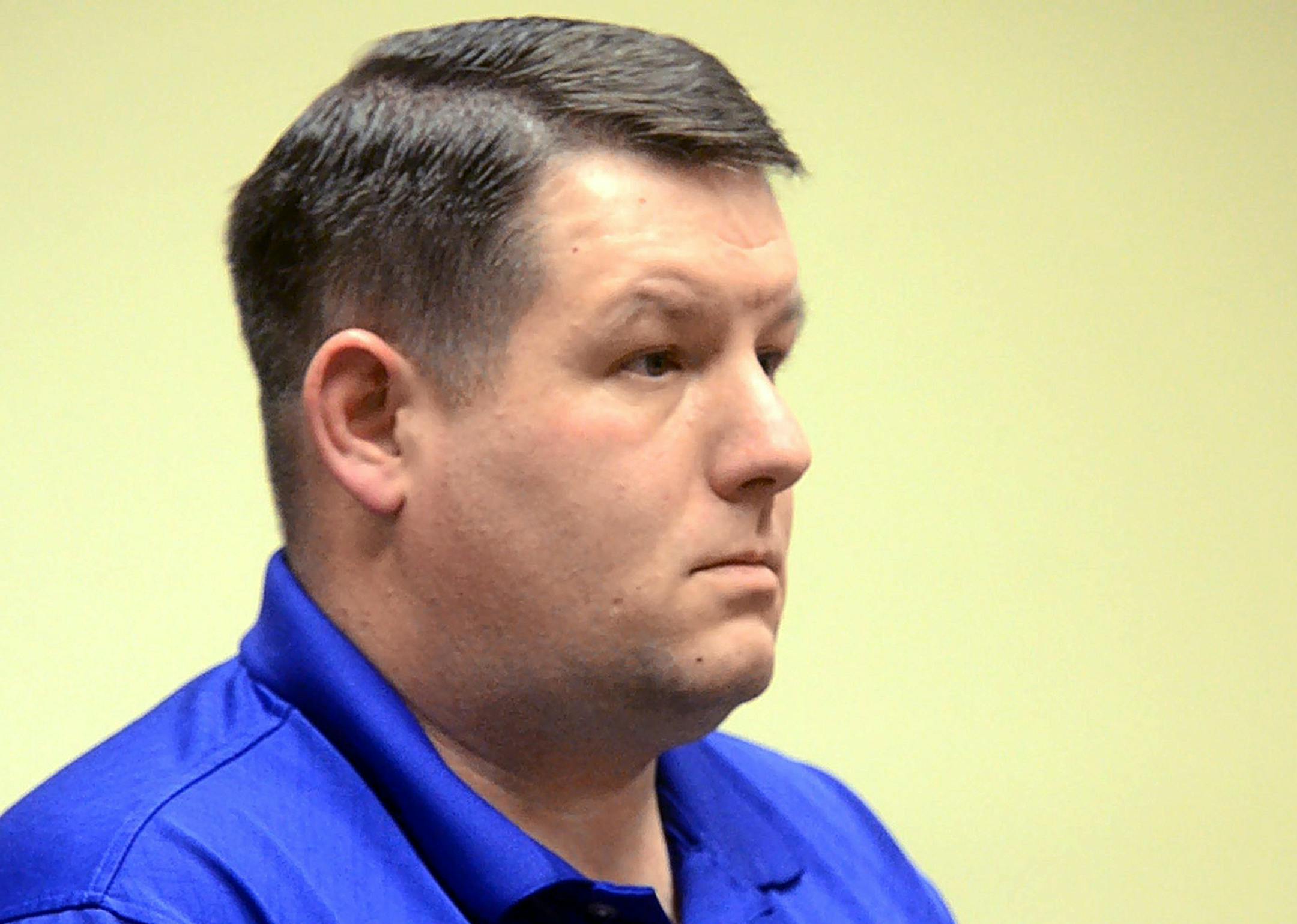 Richard Combs, the former police chief and sole officer in the small town of Eutawville listens in court, Thursday, Dec. 4, 2014, in Orangeburg, S.C. Combs, who fatally shot an unarmed black man in South Carolina in 2011 was charged with murder, and his lawyer accused prosecutors of taking advantage of national outrage toward police to get the indictment. (AP Photo/The Times and Democrat, Larry Hardy)