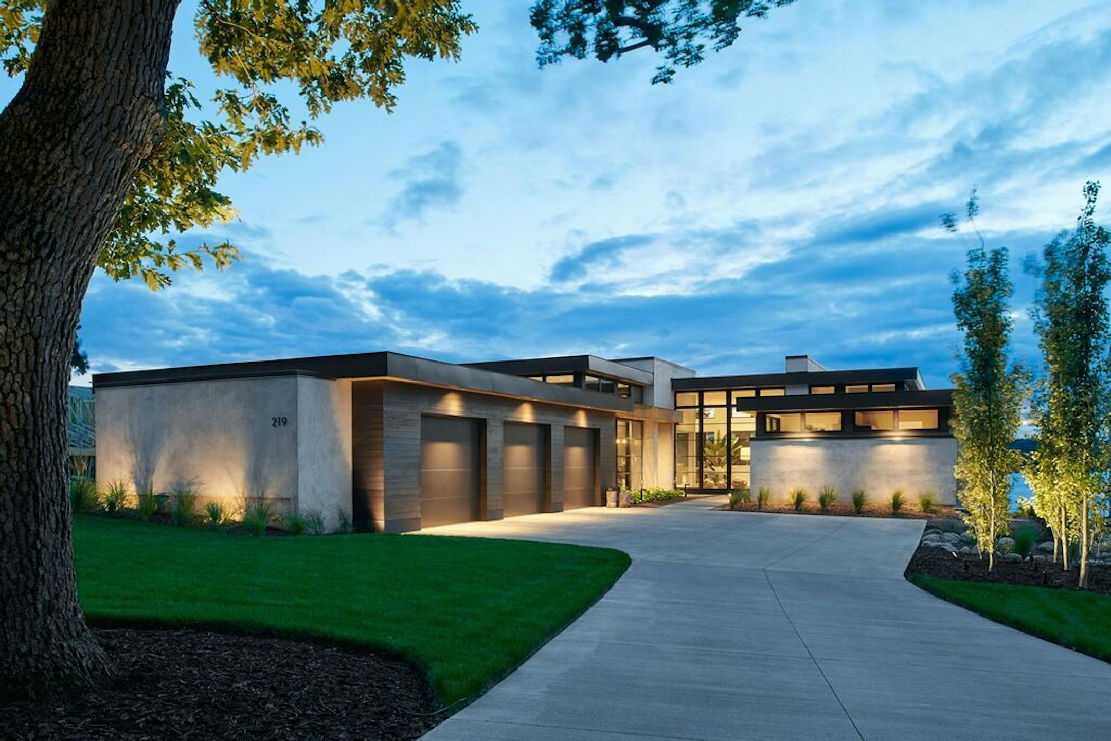 This modern lake home in Mahtomedi was designed by PLAAD.