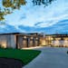 This modern lake home in Mahtomedi was designed by PLAAD.