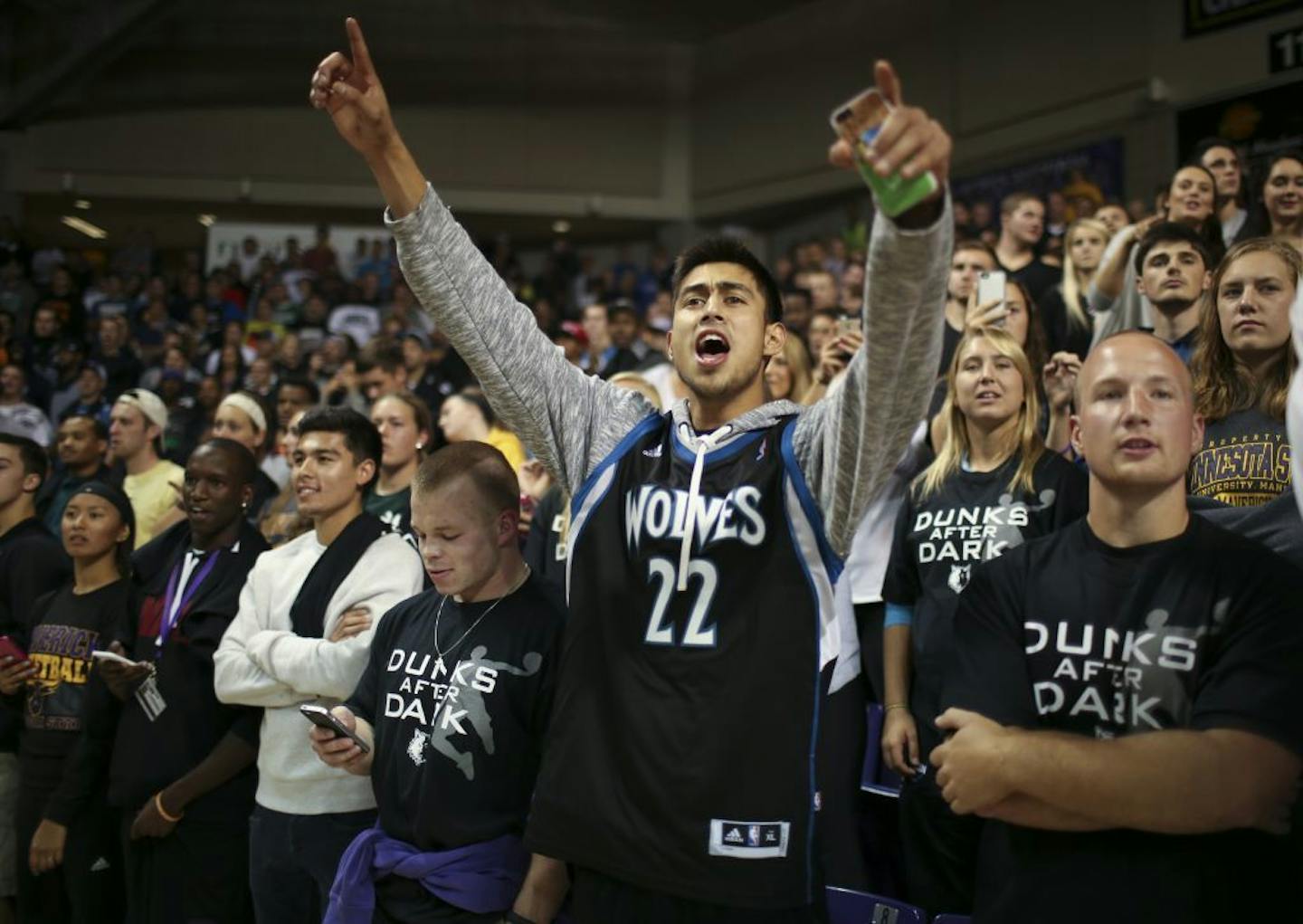 Fans watched the Timberwolves warm up before they scrimmaged during their first workout of the season early Tuesday morning at Bresnan Arena in Taylor Center in Mankato.