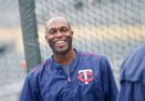 Minnesota Twins right fielder Torii Hunter laughs before a baseball game against the Pittsburgh Pirates in Minneapolis, Tuesday, July 28, 2015. (AP Ph