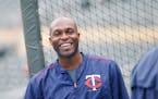 Minnesota Twins right fielder Torii Hunter laughs before a baseball game against the Pittsburgh Pirates in Minneapolis, Tuesday, July 28, 2015. (AP Ph