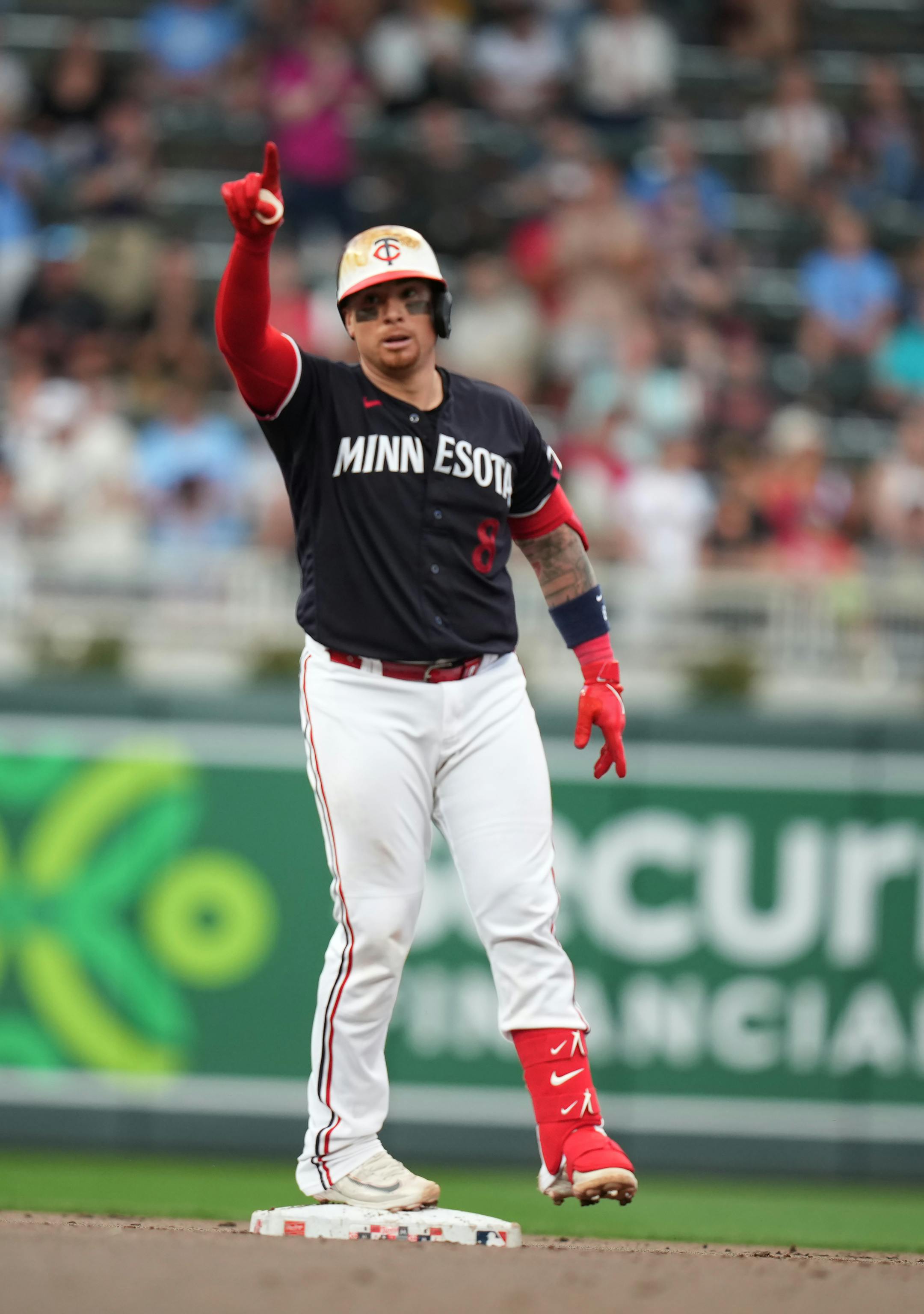 Minnesota Twins catcher Christian Vazquez (8) doubles to left in fifth inning in Minneapolis, Minn., on Thursday, June 1, 2023.