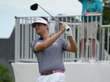 Beau Hossler teed off on the 18th hole Sunday in the final round of the 3M Open in Blaine. Hossler made par to shoot 62 and tie the tournament record.