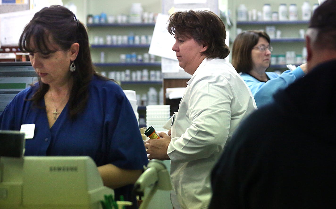 Kris Thompson filled prescriptions and waited on customers at the Lake Country Drug and Gifts store in Isle. Thompson owns the store and is also a pharmacist. ] JIM GEHRZ &#xef; james.gehrz@startribune.com /Isle, MN / March 23, 2016 2:30 PM - BACKGROUND INFORMATION: Small box stores with "dollar" in their names are changing the landscape of rural Minnesota: building like gangbusters, often in towns too small for a WalMart. Dollar General, for instance, opened 42 stores in Minnesota in the past t