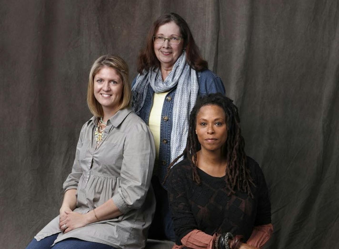 Cary Sommer, Maggie Akhavan and Kimberly Caprini volunteered to come to the Star Tribune photo studio to learn tips for relaxing in photos. A confident attitude shows, experts say.