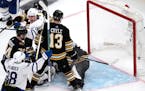 Toronto Maple Leafs left wing Matthew Knies (23) celebrates after his game-winning goal on Boston Bruins goaltender Jeremy Swayman (1) during overtime