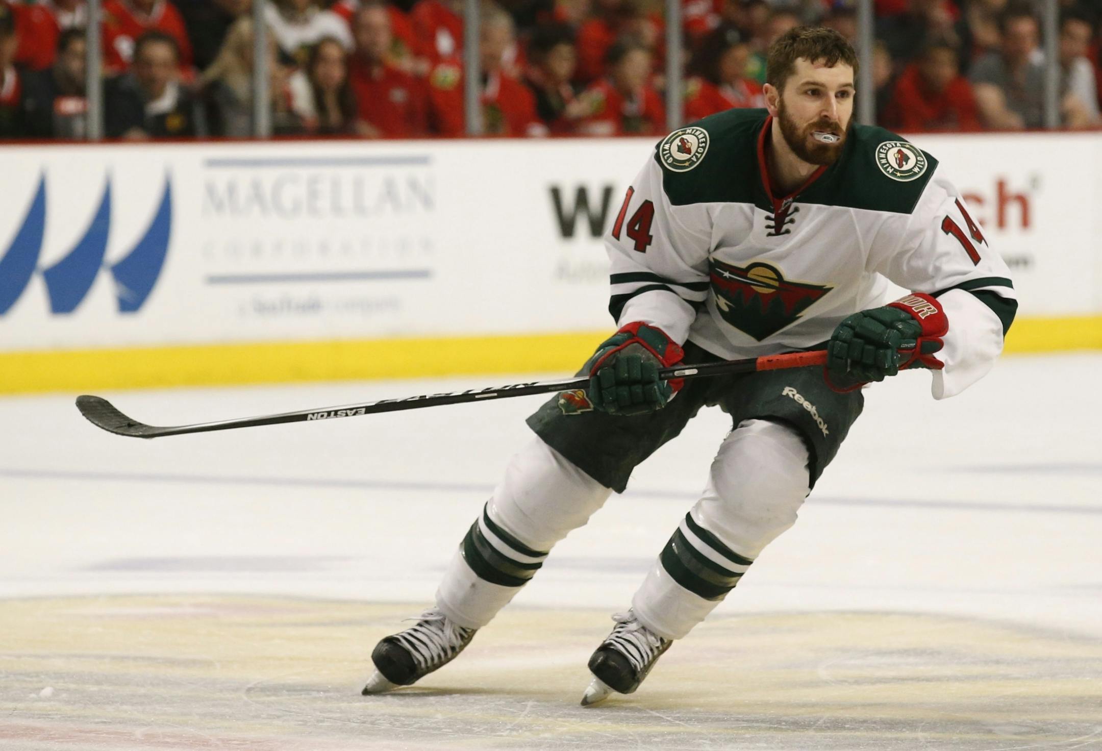 Minnesota Wild right wing Justin Fontaine (14) during the first period of their game Sunday at the United Center.