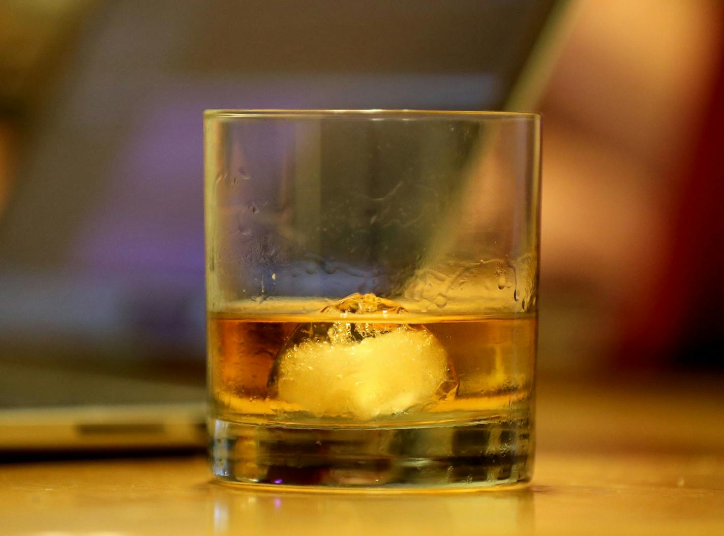 Passionate birder Sharon Stiteler, nicknamed &#xec;Bird Chick,&#xee;, and her non-birding husband Bill Stiteler, nicknamed "non-birding Bill," have a humorous podcast about birding that they produce in their Minneapolis apartment. During the lighthearted podcast, they always drink whiskey. Here, a glass of whiskey sits on the kitchen table during the Stiteler's recording of their birding podcast from their home Friday, Aug. 12, 2016, in Minneapolis, MN.](DAVID JOLES/STARTRIBUNE)djoles@startribun