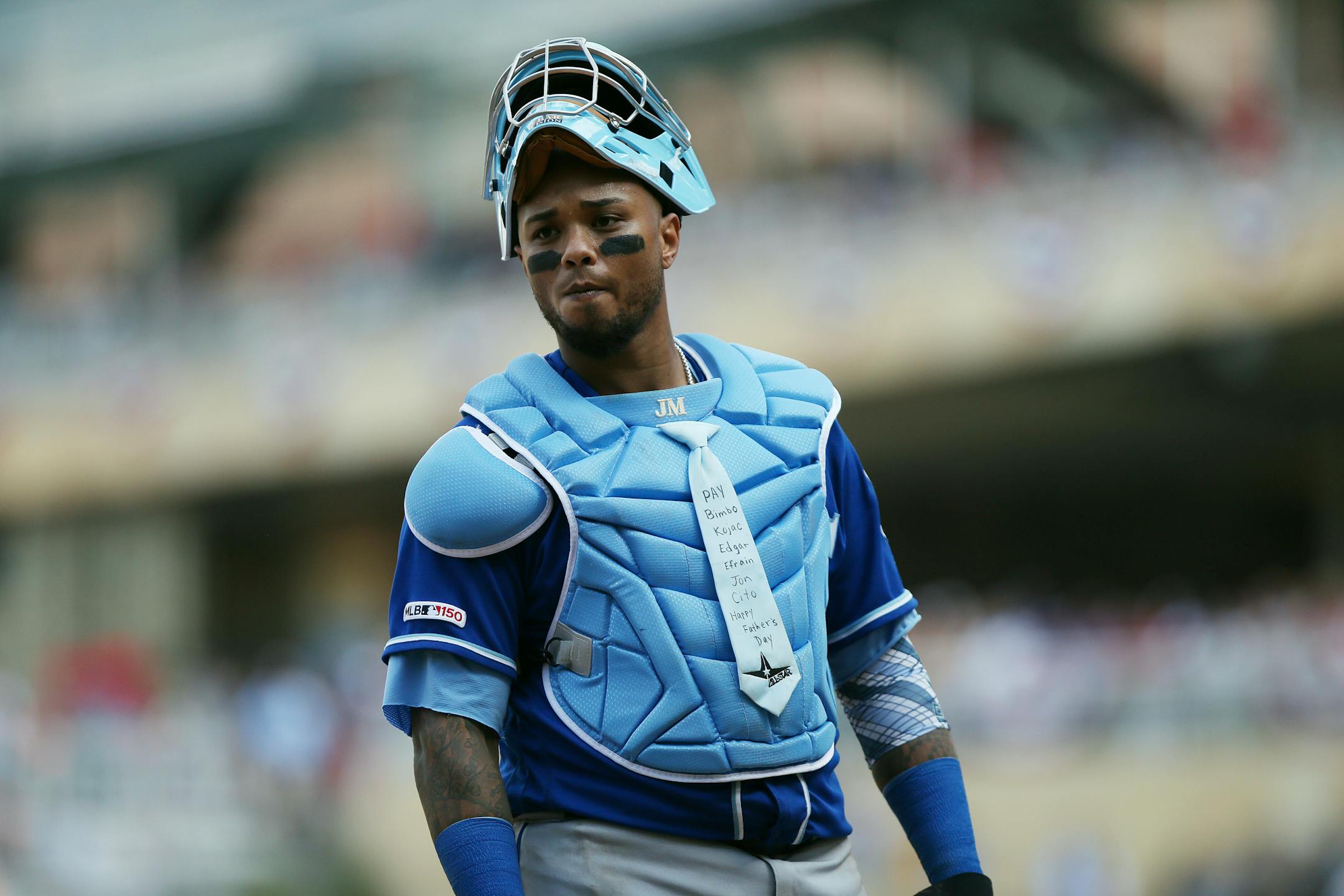 Royals catcher Martin Maldonado celebrated Father's Day by wearing a blue necktie on his chest protector (and had three hits) to lift Kansas City past the Twins 8-6 on Sunday.