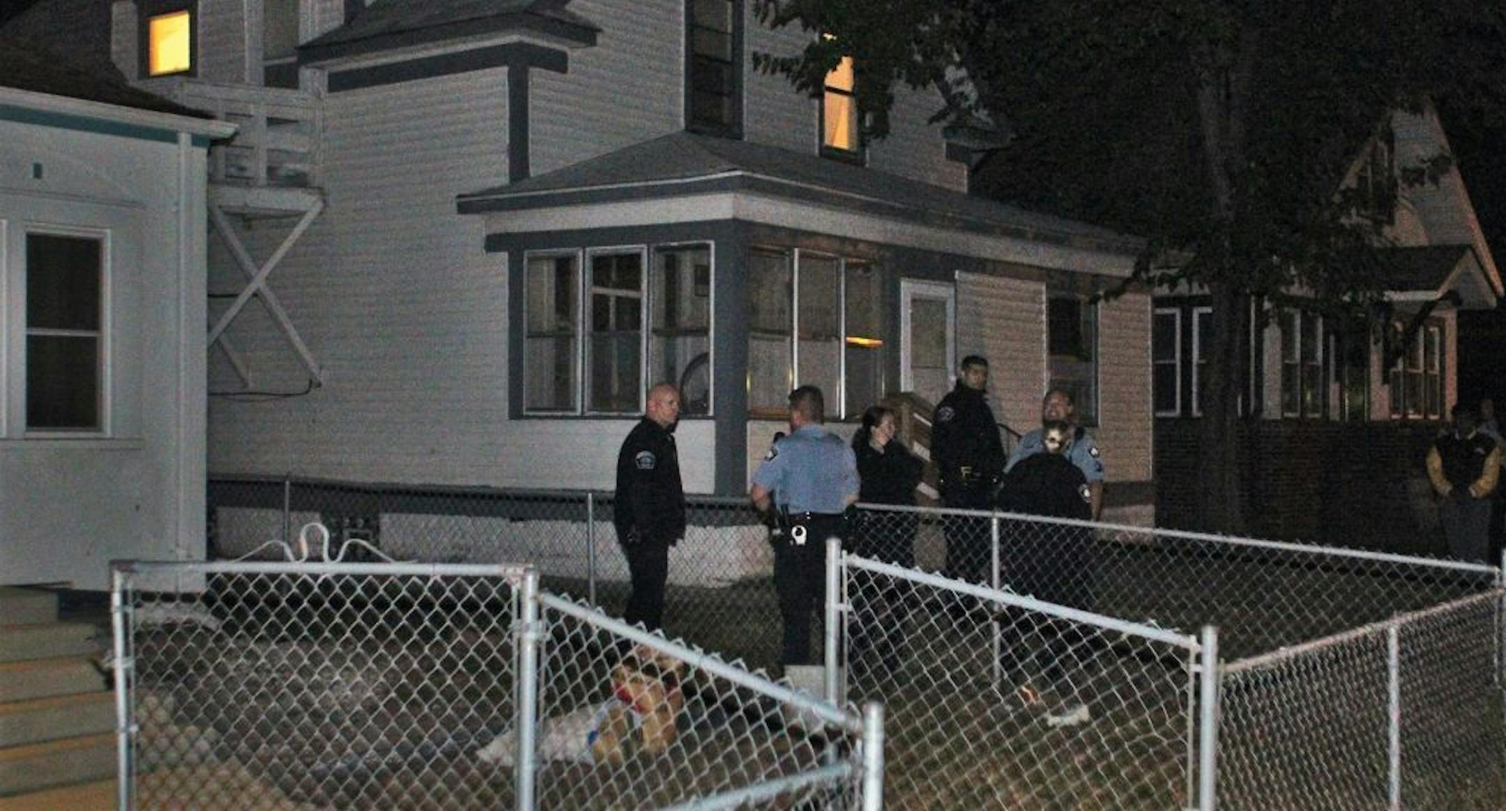 Minneapolis police investigate a shooting Wednesday night in 1500 block of Queen Av North in Minneapolis.