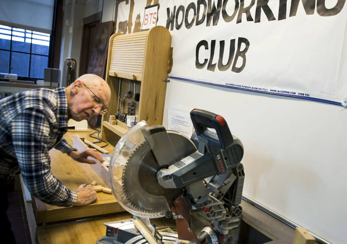 At 92, Dick Swift is the oldest member of the Glencoe club. The group has more than 40 members and operates in the basement of the old high school.