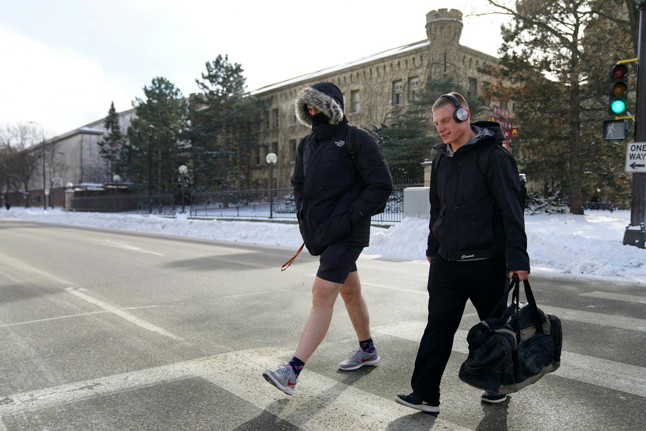 Miles, a University of Minnesota student who declined to give his last name because he said his mom would be mad at him for how he was dressed, crossed University Avenue Southeast in shorts Tuesday.