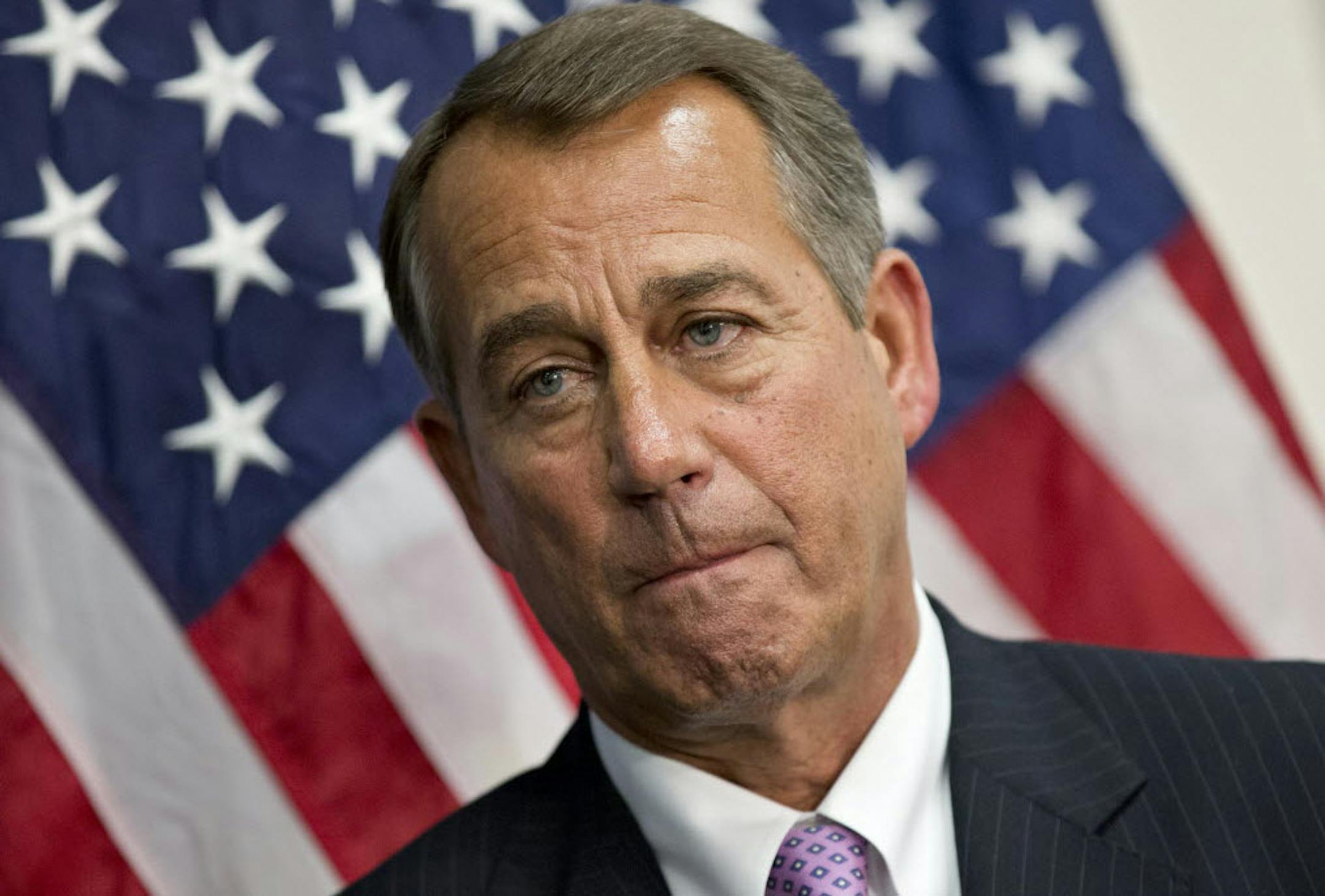 Speaker of the House John Boehner, R-Ohio, talks to reporters after a long closed-door meeting on a strategy to deal with a potential debt crisis.