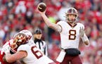 Minnesota quarterback Athan Kaliakmanis (8) throws a pass during the first half against Wisconsin at Camp Randall Stadium on Saturday, Nov. 26, 2022, 