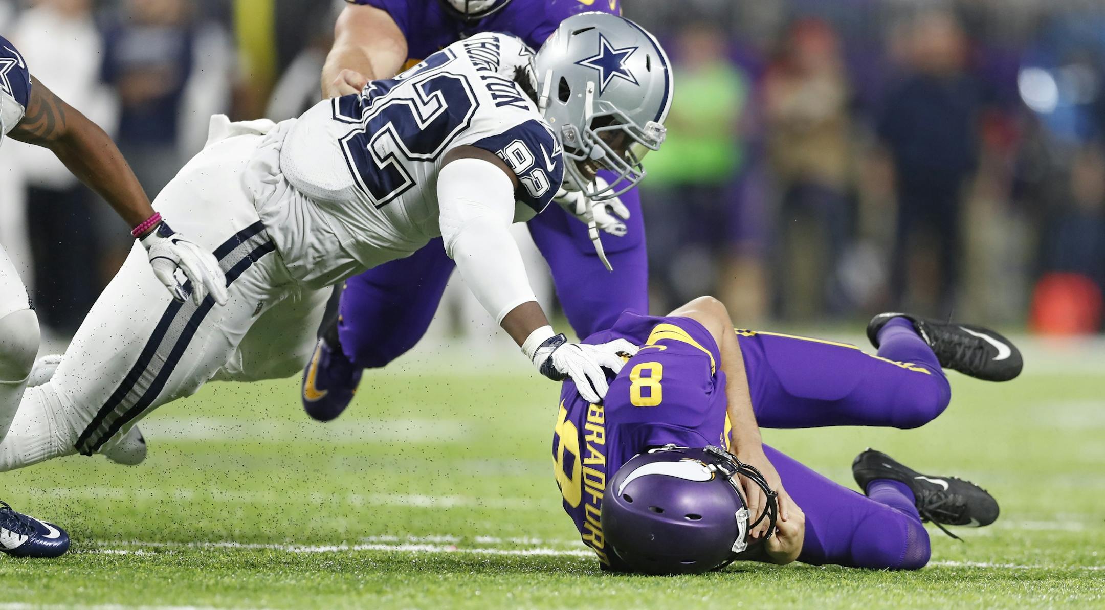 Dallas Cowboys defensive tackle Cedric Thornton (92) sacked Minnesota Vikings quarterback Sam Bradford (8) in the forth quarter at U.S. Bank Stadium Thursday December 01,2016 in Minneapolis MN. The Minnesota Vikings hosted the Dallas Cowboys