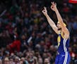 Warriors guard Klay Thompson celebrated after scoring a three-pointer -- one of an NBA-record 14 threes he made against the Chicago Bulls on Monday ni