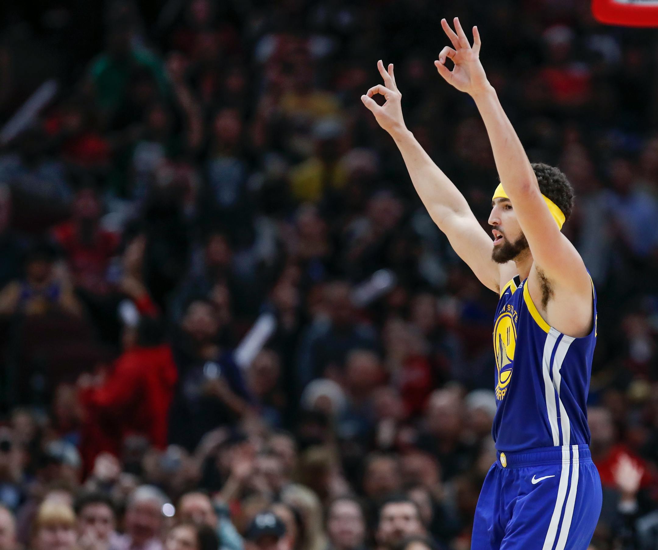 Warriors guard Klay Thompson celebrated after scoring a three-pointer -- one of an NBA-record 14 threes he made against the Chicago Bulls on Monday night.