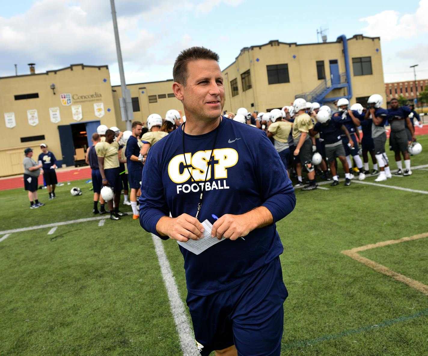 Concordia-St. Paul football head coach Shannon Currier walked to mid field after talking to the team at the start of Tuesday's practice. ] (AARON LAVINSKY/STAR TRIBUNE) aaron.lavinsky@startribune.com Concordia-St. Paul has brought back Shannon Currier as coach. Currier had four winning seasons in as many years at Concordia before moving to Truman State, where he was fired after five years. After working seven years as a sales manager, he's back at Concordia, which was 1-10 a year ago. We photogr