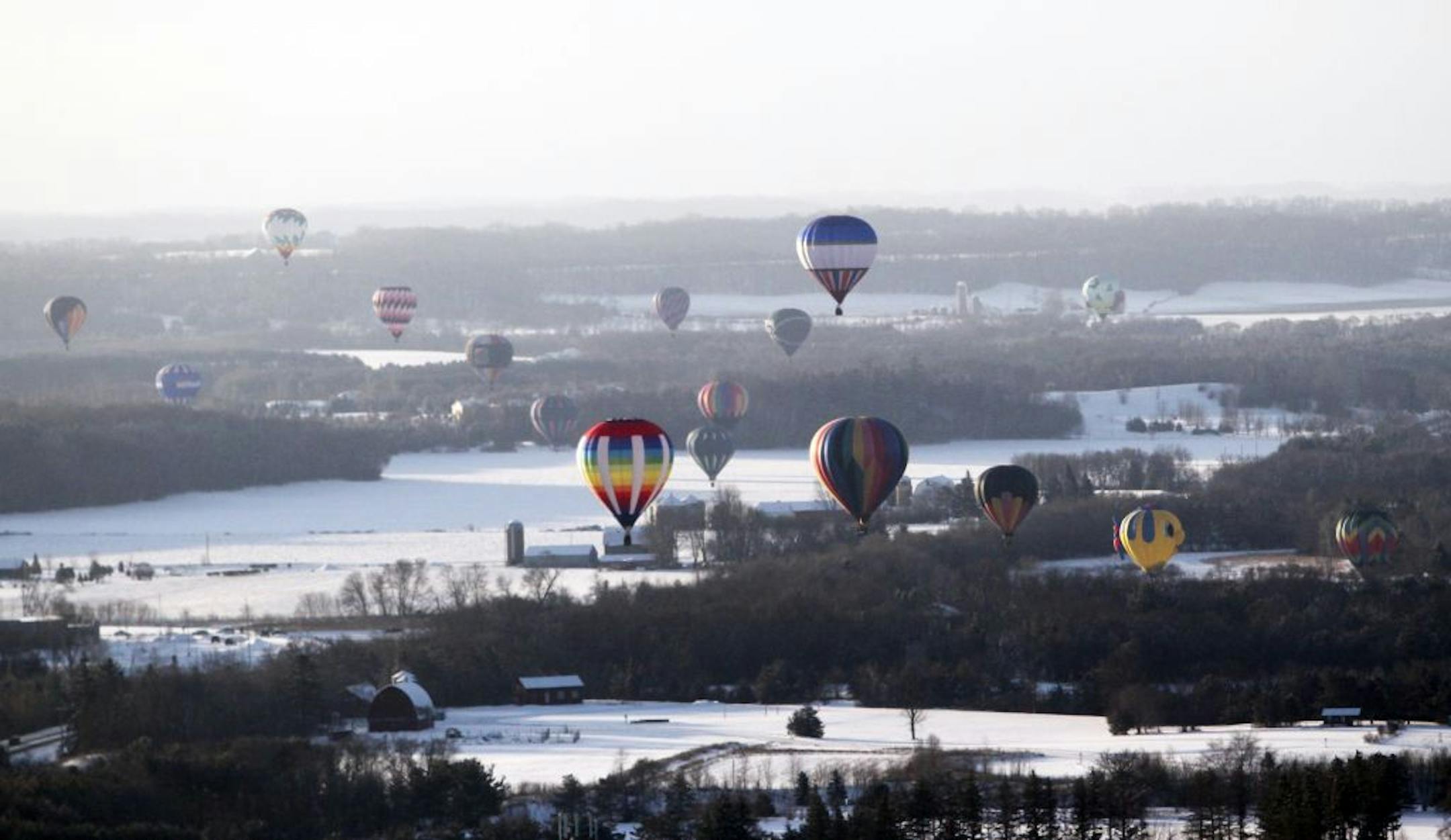 Hot air balloons filled the skies during the 24th annual Hudson Hot Air Affair Saturday, Feb. 2, 2013, in Hudson, WI.