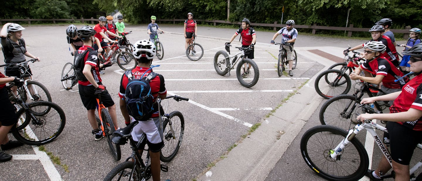 The Shakopee High School mountain bike team gathered before a ride at the Bloomington Ferry Unit trail recently.