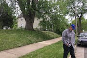 Developer Bruce Barron walks away from a vacant lot in north Minneapolis, where he plans to build a house through a new city program incentivizing hom