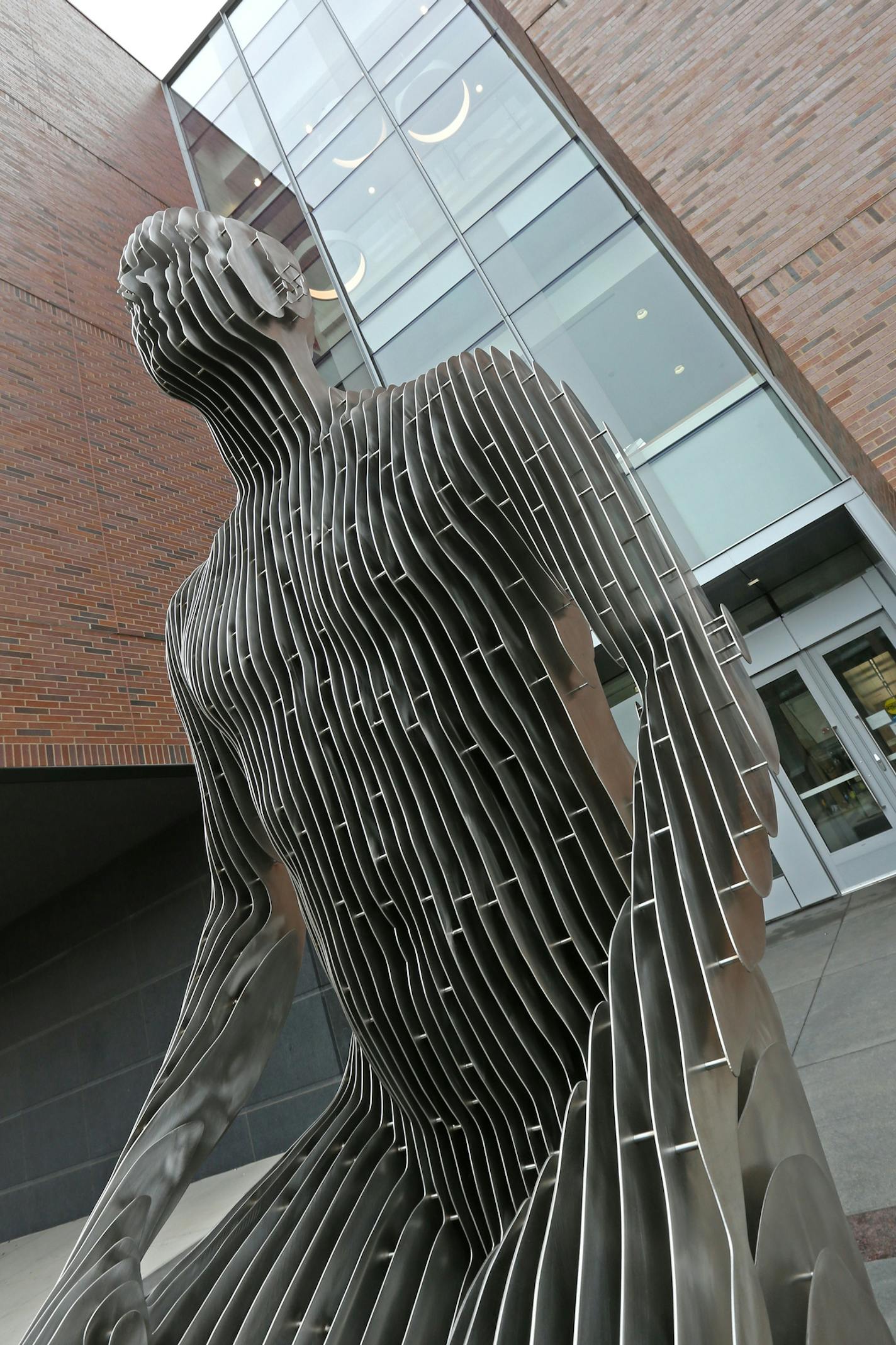 "Spannugsfeld" by artist Julian Voss-Andreae, one of two figures by the artist installed at the new University of Minnesota Physics and Nanotechnology Buidling. The University of Minnesota formally unveiled its latest monument to high technology: the new Physics and Nanotechnology Building, giving tours to the media and public on 4/23/14. The 84.5 million building is the home of the School of Physics and Astronomy and the Minnesota Nano Center. The building is located at 115 Union St. S.E., Minn