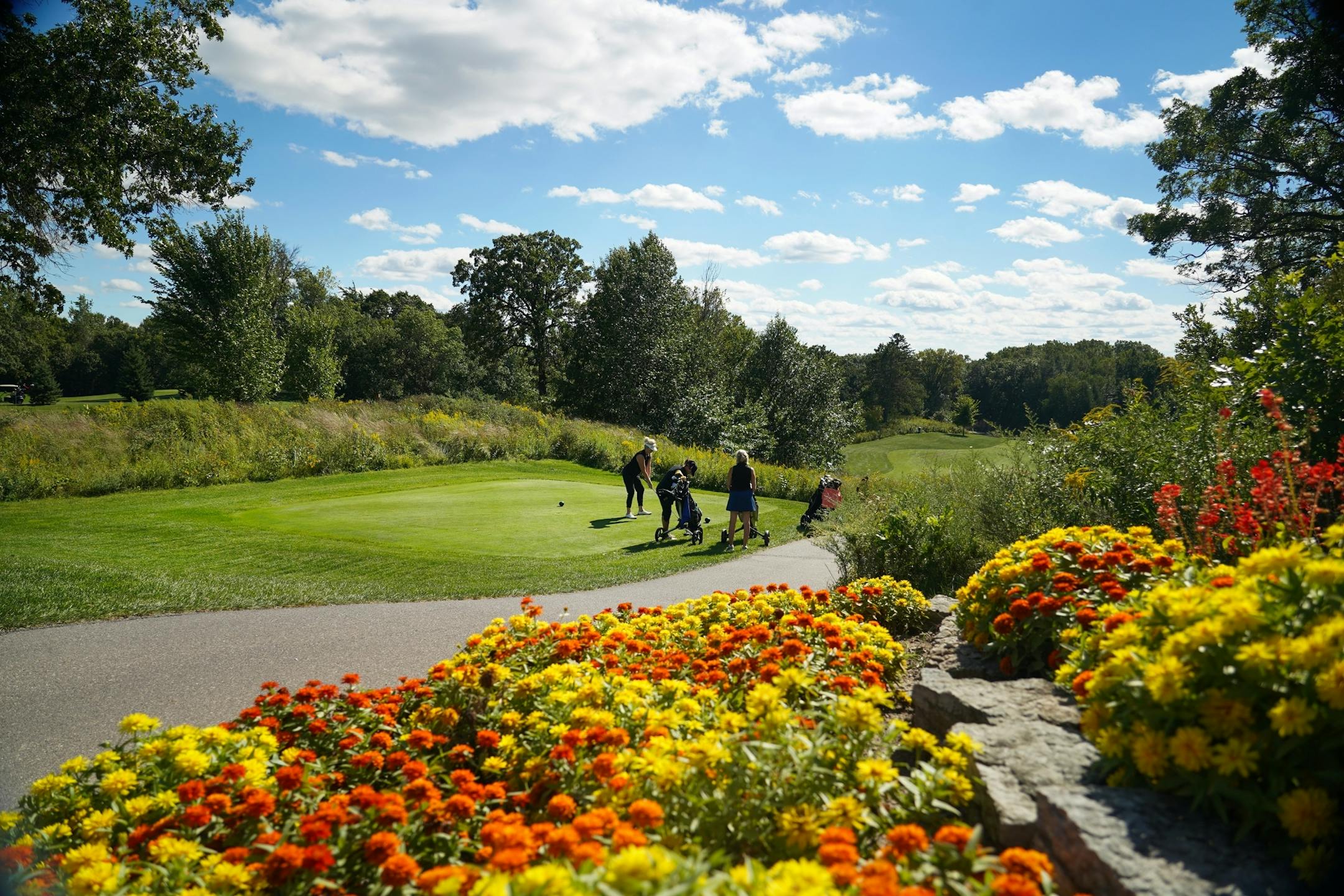 Golfers endured a windy day to get out on the links at Keller Golf Course in Maplewood.