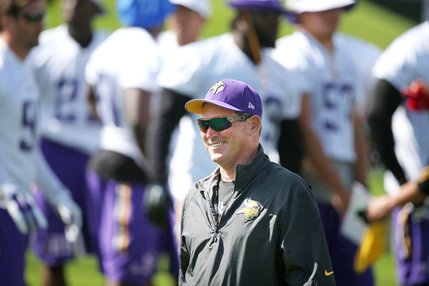 Coach Mike Zimmer wore a smile during Sunday's morning walk-through, the Vikings' first taste of training camp. "Guys are pretty focused and into it," Zimmer said. "I like this team."