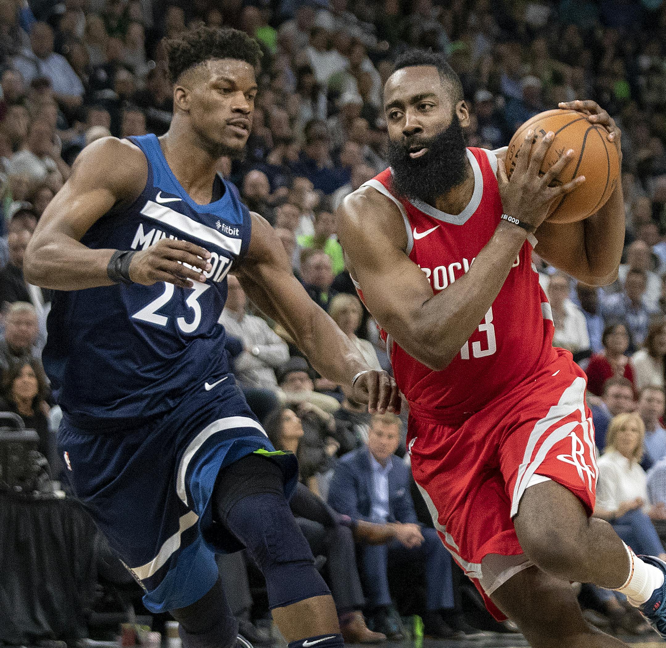James Harden (13) was defended by Jimmy Butler (23) in the third quarter. ] CARLOS GONZALEZ ï cgonzalez@startribune.com ñ April 23, 2018, Minneapolis, MN, Target Center, NBA Playoffs, Basketball, Minnesota Timberwolves vs. Houston Rockets, Game 4