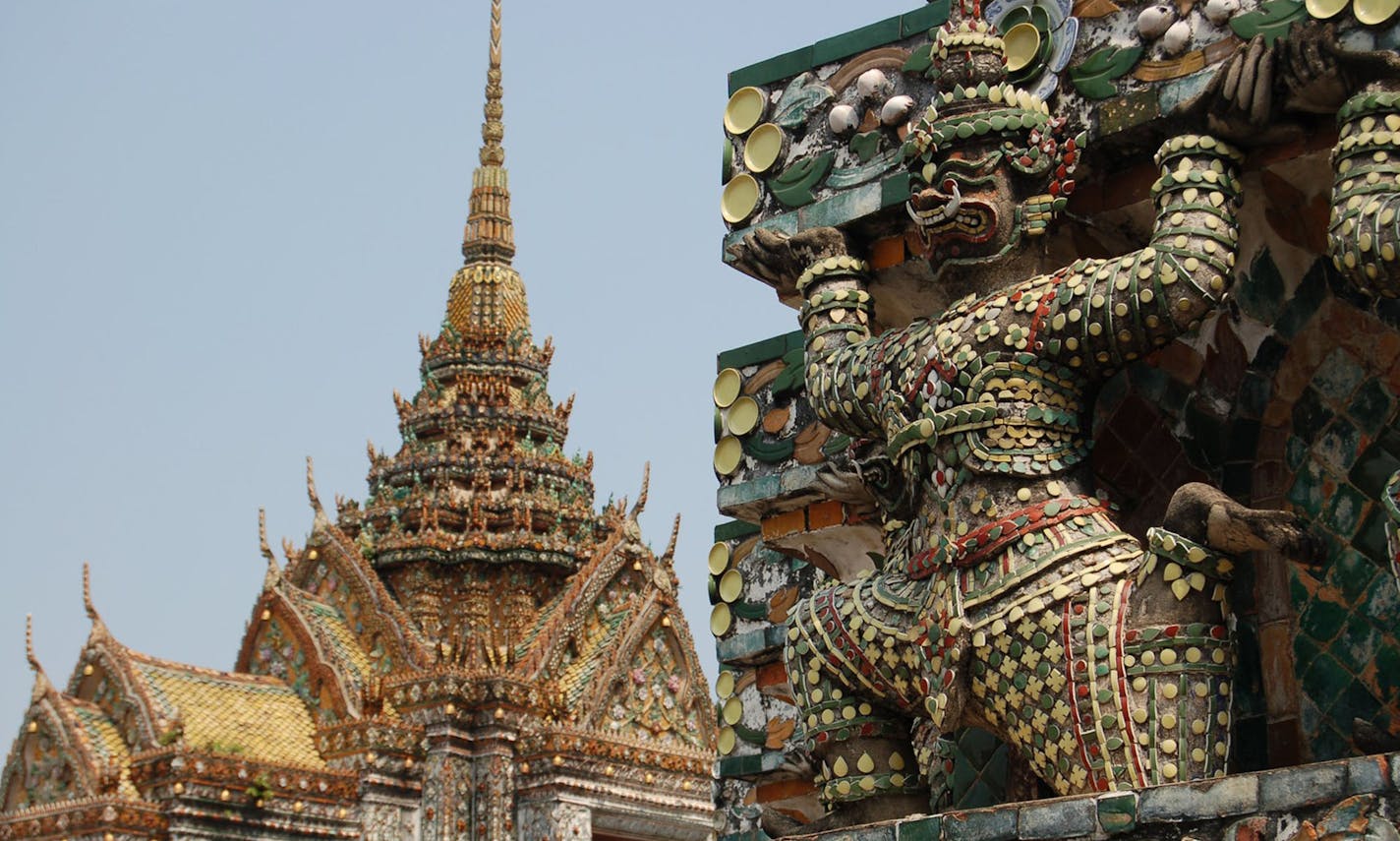 At Wat Arun, the Temple of the Dawn, in Bangkok, Thailand, pieces of porcelain adorn the temples and the mythological creatures lining the facade. (Susan Hegger/St. Louis Post-Dispatch/TNS)