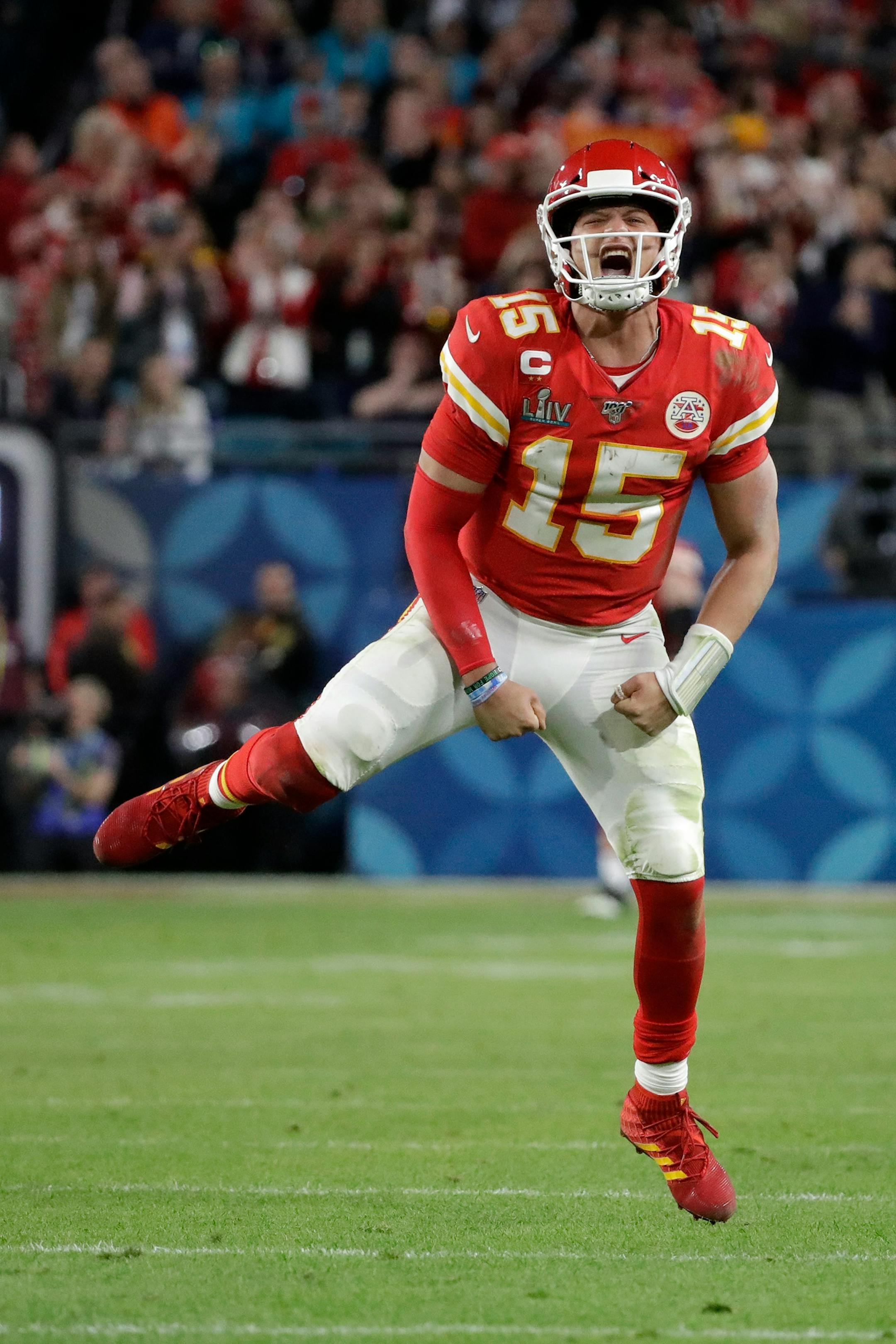 Kansas City Chiefs quarterback Patrick Mahomes (15) celebrates a long pass against the San Francisco 49ers during the second half of the NFL Super Bowl 54 football game Sunday, Feb. 2, 2020, in Miami Gardens, Fla.