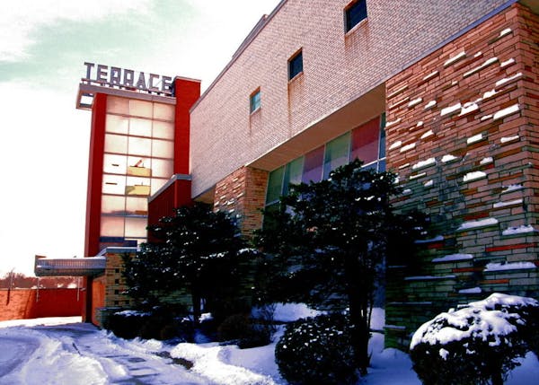 Liebenberg and Kaplan's 1951 Terrace Theater in Robbinsdale features modern lines, brick columns, slanted lobby windows and a glassy tower.